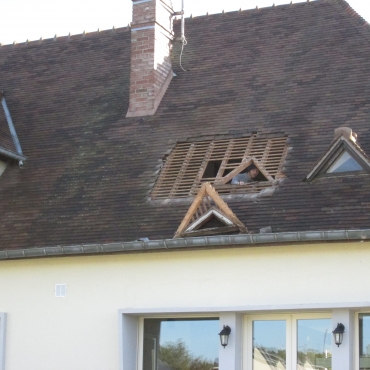 Remplacement d'un outeau par fenêtre de toit